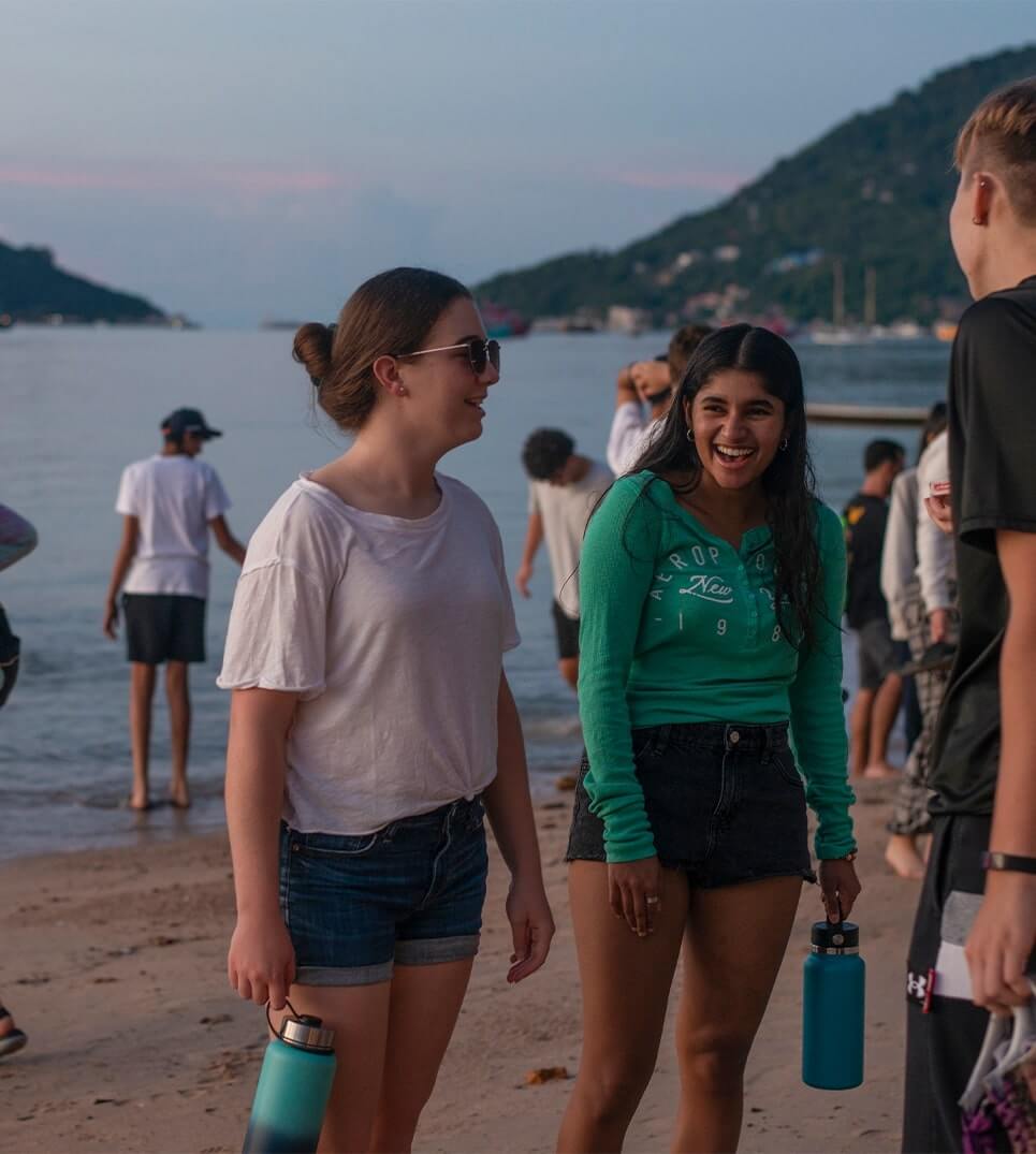 Young-people-on-beach-at-dusk